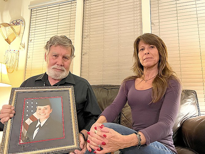 Eddie and Paula Montanucci hold the portrait of their daughter Fallon who was killed April 23 by a wrong-way drunken driver.