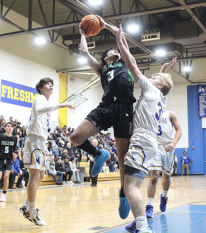 Fallon’s Shawn McAlexander goes up against Lowry in the Greenwave’s 3A East win last week in Winnemucca.