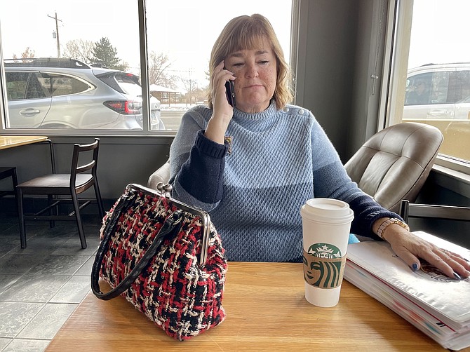 Mayor Lori Bagwell talking to a constituent on the phone at Starbucks on Jan. 13.