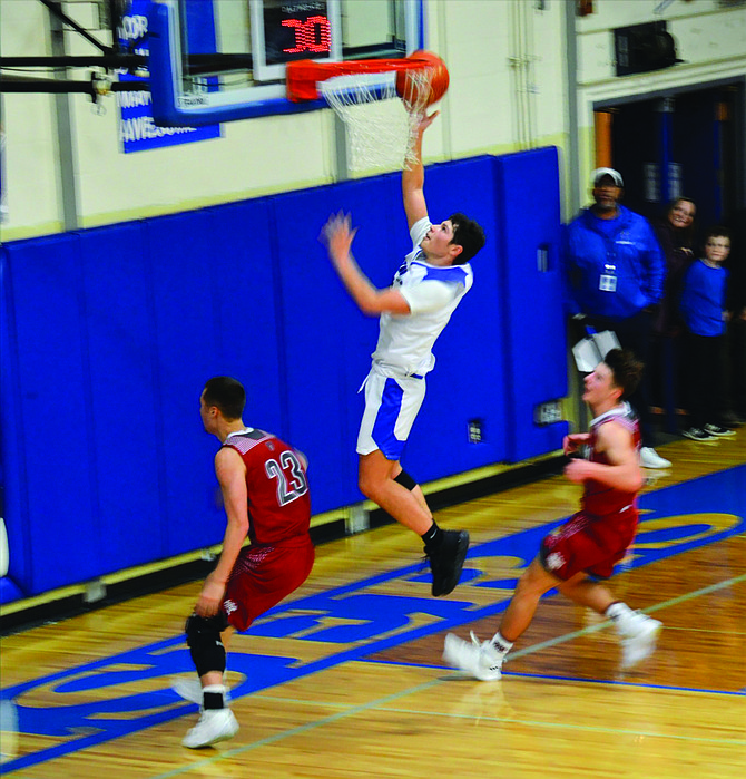 Eatonville’s Griffin Clevenger scores two of his career-high 24 points in the Cruisers’ victory over Hoquiam.