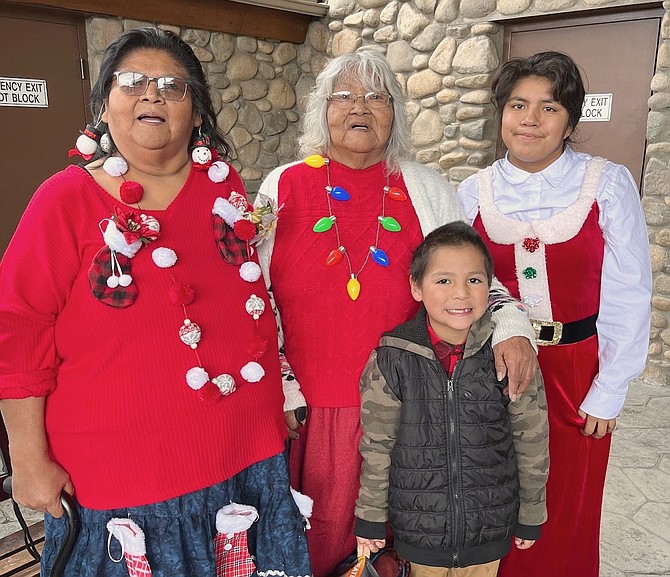 Karen Lundy, Dinah Pete and grandchildren all of Woodfords at the Washoe Tribe Christmas Party at the Carson Valley Inn on Dec. 22.
Photo special to The R-C by Meg McDonald