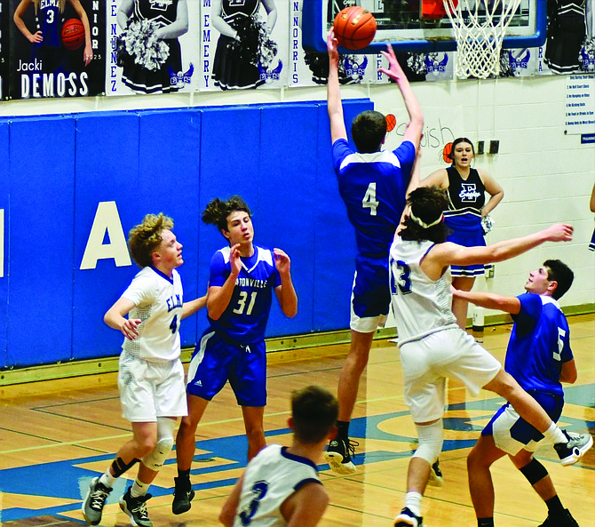 Eatonville senior Shane Taylor pulls down one of his 10 rebounds against Elma last week. Taylor recorded his first career double-double as he helped the Cruisers down the Eagles, 68-58.