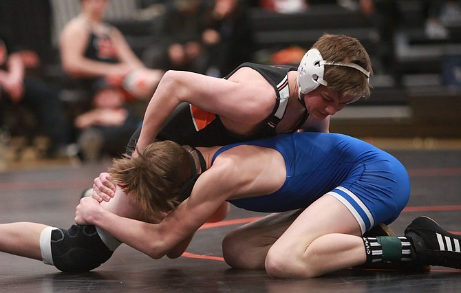 Douglas High's Gunnar Bleeker works atop his opponent Wednesday. Bleeker and the Tigers took fourth at the Vaquero Classic over the past weekend.