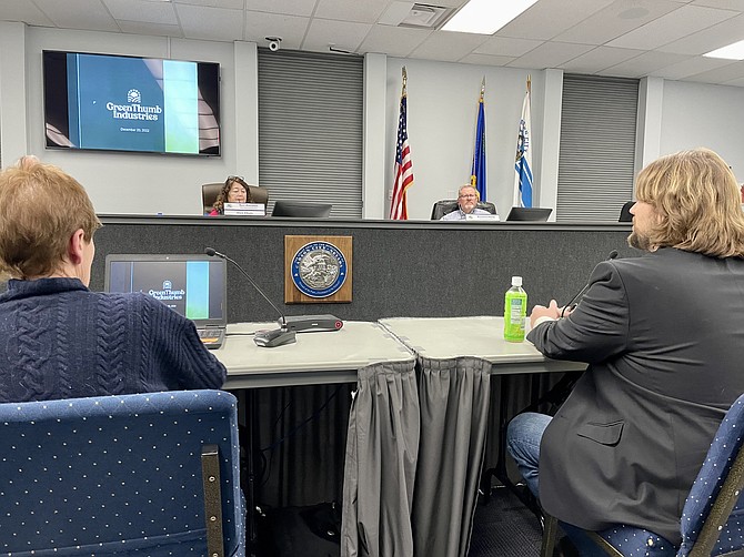 Carson City Community Development Director Hope Sullivan, left, and Green Thumb Industries representative Will Adler, right, speak at the planning commission meeting Wednesday.