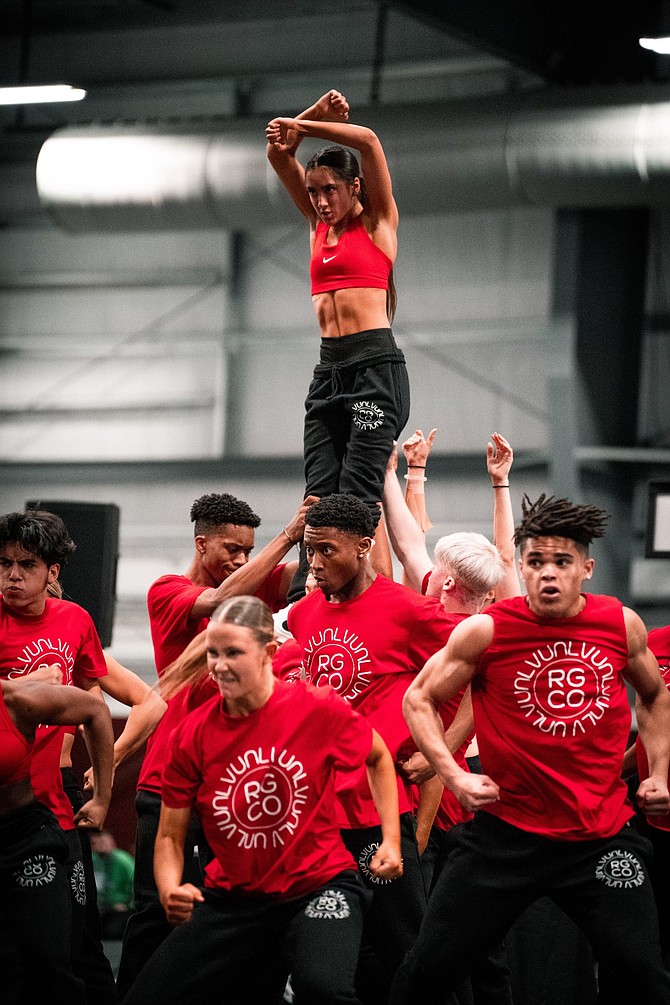 UNLV junior and Carson High alum, Taryn Encinas (middle), gets lifted into the air during a practice routine of UNLV Rebel girls and company’s hip-hop performance. Encinas and the Rebels doubled-up on national championships in Orlando two weeks ago.