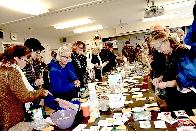 Dozens of people came out to swap seeds and gardening tips during UNR Extension Douglas County Master Gardner’s seed swap Saturday.