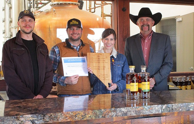 Fallon's Frey Ranch Distillery has won the 2022 Nevada Agriculture, Food & Beverage Small Business of the Year Award. From left, Brad Scribner of Made in Nevada, Frey Ranch Distillery owners Colby and Ashley Frey, and Nevada Agriculture Commissioner JJ Goykoechi in his room at the Frey Ranch Distillery tasting.