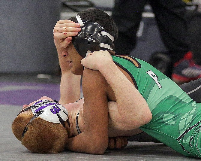 Fallon’s Andre Green, who pinned Spring Creek's Scottie Adams in the 113-pound division, finished 9-2 in last weekend’s duals. Fallon travels to Wooster this weekend for the regional tournament.