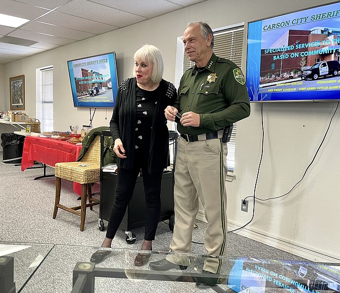 Carson City Chamber of Commerce Executive Director Ronni Hannaman with Sheriff Ken Furlong at the chamber office Thursday.