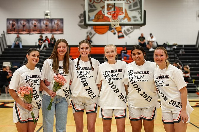 The six seniors of Douglas High girls basketball pose for a photo Friday before taking on Carson. Pictured from left to right are Gabrielle Wallace, Camden Miller, Addy Doerr, Abigail Girnder, Breanna Williams and Riley Hoffman.