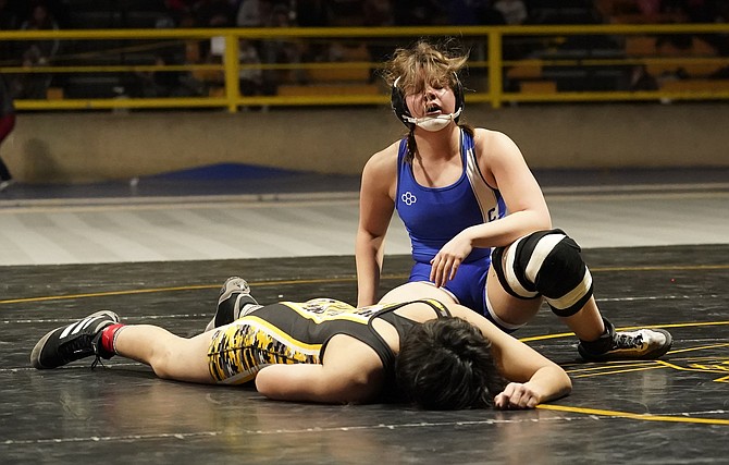 Carson High’s Ellah Olson reacts after winning the girls 152-pound state title Saturday in Winnemucca. Olson became the first Carson High girls wrestler to win a state title.