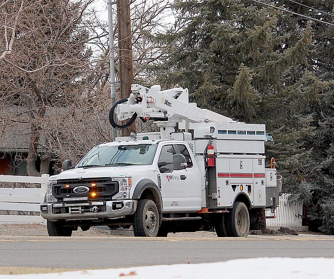 NV Energy trucks swarm County Road for a power outage in Minden on Tuesday afternoon.