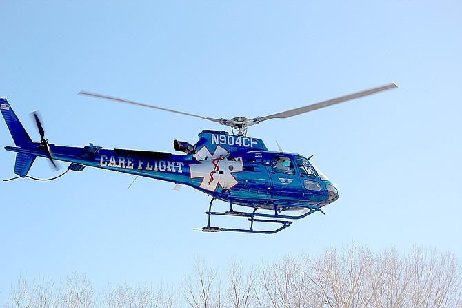 The Care Flight ambulance helicopter takes off from Gardnerville on Saturday morning to transport a skier who collided with a tree at Heavenly Ski Resort.