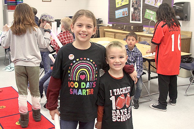 Savannah, 9, and Keegan, 6, Koontz had fun playing games during the 100th day of school event at Minden Elementary school Thursday.