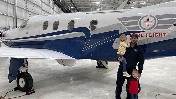 Photo courtesy Carson Tahoe Health/ Ed Pricola pictured with his two children. Pricola was killed in the line of duty in a plane crash in Lyon County on Feb. 24. The public is invited to watch a private vigil for him Friday at 5 p.m.