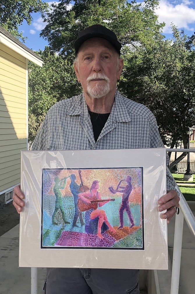 Artist Mike Bond shows his winning artwork, “Listen to the Music,” used for the 2022 Jazz & Beyond flyer, program and T-shirt.