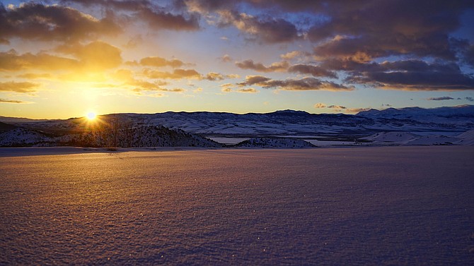 Tuesday's sunrise over an icy landscape in Topaz Ranch Estates. Photo special to The R-C by John Flaherty