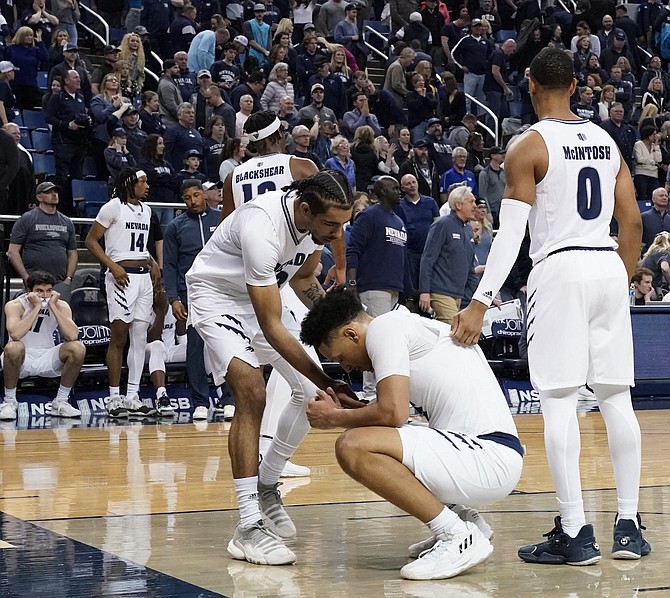 The Wolf Pack, shown here against UNLV on Saturday, may need to beat San Jose State on Thursday to make the NCAA Tournament, Joe Santoro writes.