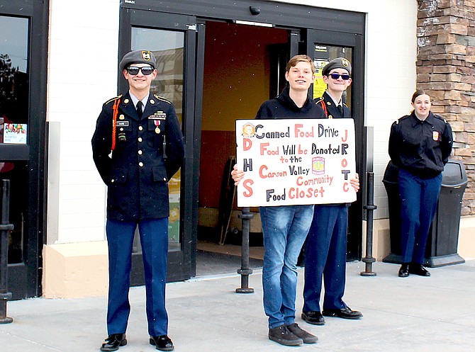 Cadet/Corporal Jacob Haire, Cadet/Private First Class Clifford Kelley, Cadet/Private First Class Jack Haire, Cadet/Corporal T.J. Bertrand gather donations from in front of the Gardnerville Smith’s on Saturday.