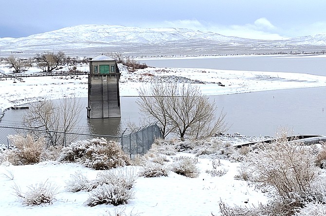 Lahontan Reservoir is shown under a cover of snow last week. The level is rising and could approach 150,000 acre-feet by the weekend.