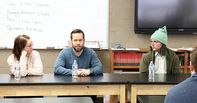 From left, Alex and Kelsie Hall, foster parents who have taken nine youth into their home, and Justin Bake, a former foster youth who has aged out of the system, discuss their experiences Saturday.