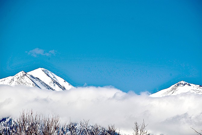 Jobs Peak wreathed with clouds on St. Patrick's Day. Photo special to The R-C by Tim Berube