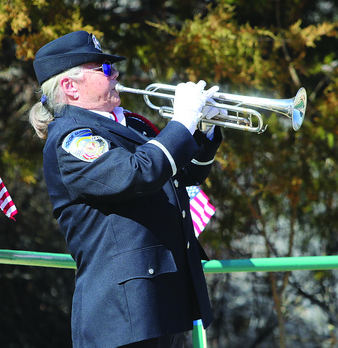 Mary Sedgwick, a bugler from the Nevada Veterans Coalition in Fernley, plays taps at a previous National Vietnam War Veterans Day ceremony.