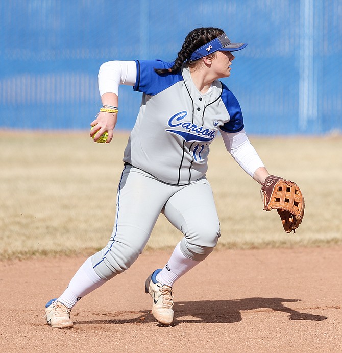 Carson High shortstop Sofia Morrison rises to throw to first base after fielding a grounder Monday afternoon against Spanish Springs. Morrison was 1-for-3 with a solo home run in the fifth inning.