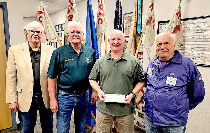 Tahoe-Douglas Elks Crab Feed Co-Chairman Kirby Mays, Past Exalted Ruler and Past Elks State President Dan Wells, retired Col. Michael Glynn and Past Exalted Ruler Jim Plamenig.