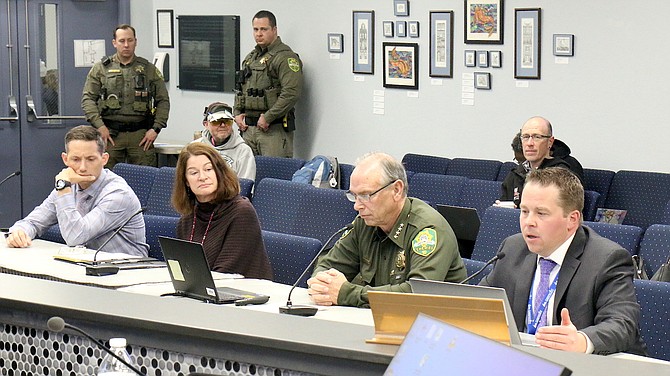 Carson High Principal Bob Chambers, left, district risk manager Ann Cyr, Sheriff Ken Furlong and Superintendent Andrew Feuling discuss school safety at the Carson City School Board meeting March 14.