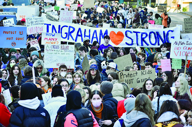 Seattle students organized a march protesting gun violence after a school shooting at Ingraham High School in November of last year. District 36 Rep. Liz Berry said the state Legislature is making progress in putting more gun safety measures in place this session.
