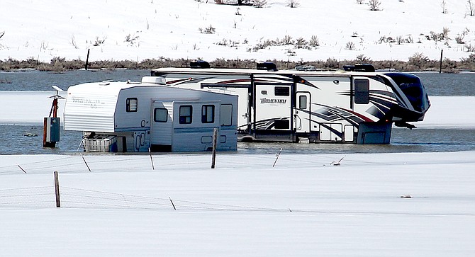 Two RVs were up to the gunnels in water at Double Spring Flat on Saturday.