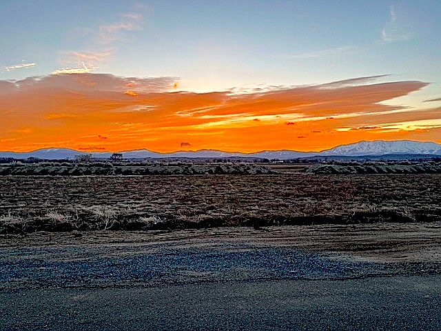 It wasn't long after this morning's dawn that Jeffrey Keenan sent in this photo taken of sunrise over the Pine Nuts. Western Nevada is looking at cooler, windier, but dry weather today and Wednesday. Spring will return starting Thursday.