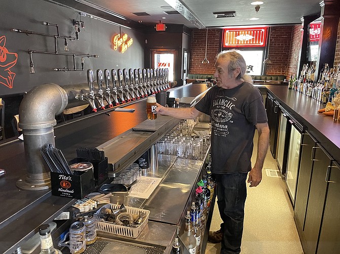 Brew master Tim Mason pouring the new Mark Twain lager at Fox Brewery and Pub in downtown Carson City on April 12.