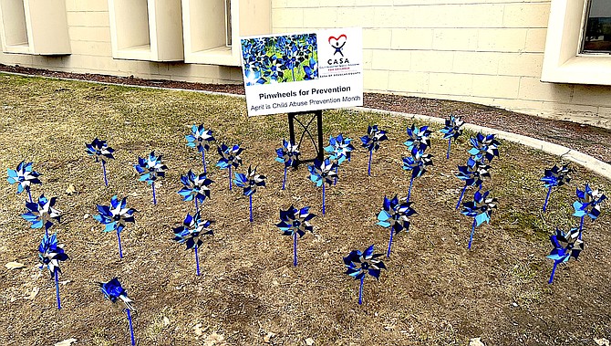 The pinwheels for Child Abuse Awareness Month were getting a workout in the wind on Tuesday at the Douglas County Judicial & Law Enforcement Center.