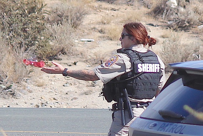 A Douglas County deputy directs traffic during a wreck on Highway 395 near Topsy Lane in September 2022.