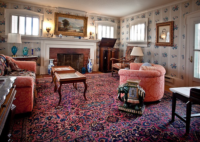 The living room of the Dangberg ranch house includes Chinese ceramics, antique furniture, and a 1906 Victrola phonograph player. Photo special to The R-C by Roy O’Brien