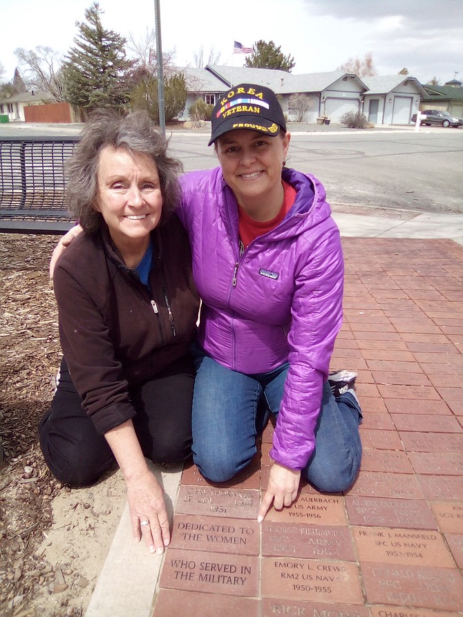 Cheryl Hanneman with daughter Janice Pearson laying new bricks at the Korean War Veterans Memorial in Carson City on April 17.