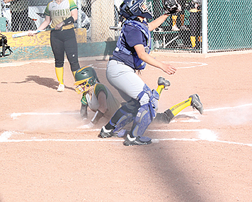 Battle Mountain's Thalia Gonzalez safely slides into home plate during Friday's game with North Tahoe in Battle Mountain. 

Battle Mountain's Thalia Gonzalez safely slides into home plate during Friday's game with North Tahoe in Battle Mountain.