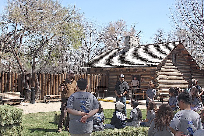 Mormon Station Park Ranger Chris Johnson presents the history of Genoa and Mormon Station to fourth- and fifth graders from McCaw Steam Academy in Henderson.