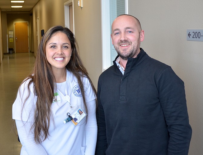 Western Nevada College RN Alba Morales and Michael Boreham, workforce development liaison for WNC ROADS program, are photographed during Nursing & Allied Health's annual Job Fair.