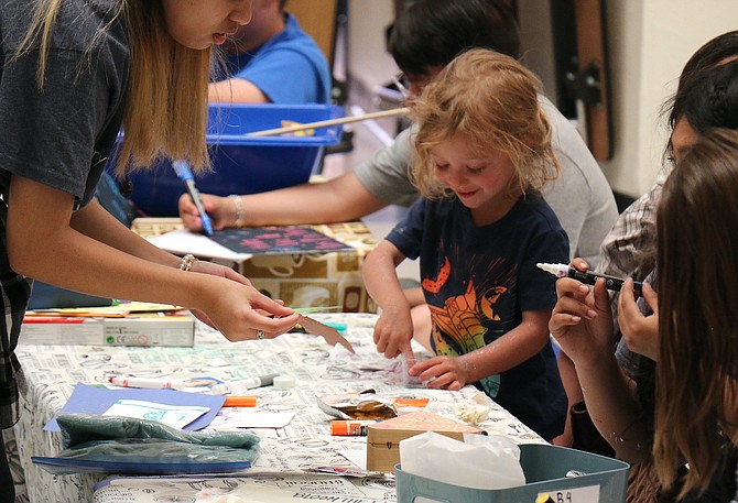Saturday’s Day of the Child event at Carson High School was a celebration for families of younger children to enjoy activities and discover resources to help with building relationships, according to Carson High School early childhood education teacher Kendra Tuttle.