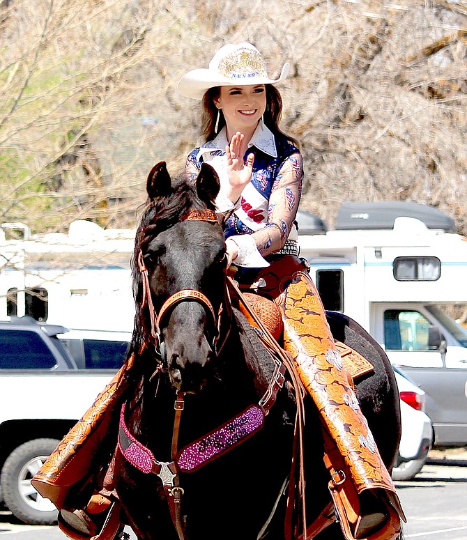 Miss Rodeo Nevada Kaila Hill waves to a fairly big crowd of onlookers at Saturday's Genoa Western Heritage Days.