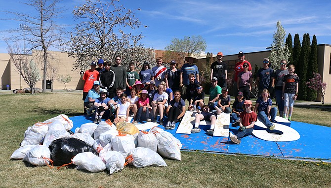 About 50 volunteers participated in cleaning up Carson High School’s grounds Saturday as part of a Global Youth Service Organization Day held by the Church of Jesus Christ of Latter-day Saints.