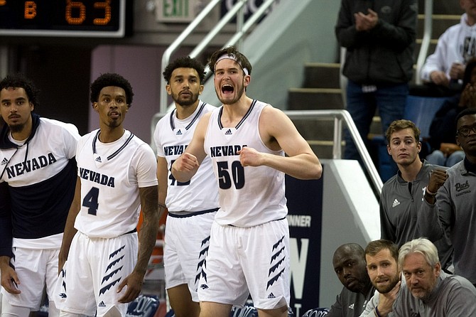 Desmond Cambridge Jr. (4) and Will Baker (50) are just two of the many Wolf Pack basketball players to have entered the transfer portal after getting significant playing time at Nevada.