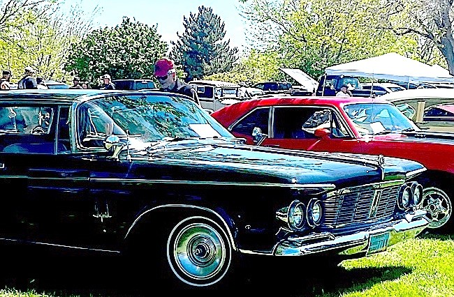 An onlooker admires a classic car at the 2022 Big Mama's Show & Shine in Lampe Park. The show is 10 a.m. to 3 p.m. May 13 at Lampe Park.