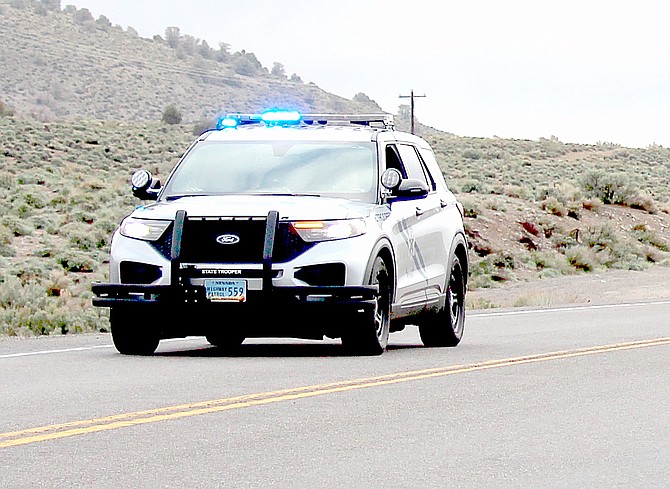 A Nevada State Police Highway Patrol vehicle escorts runners into Douglas County on May 3 for the Law Enforcement Memorial Run.
