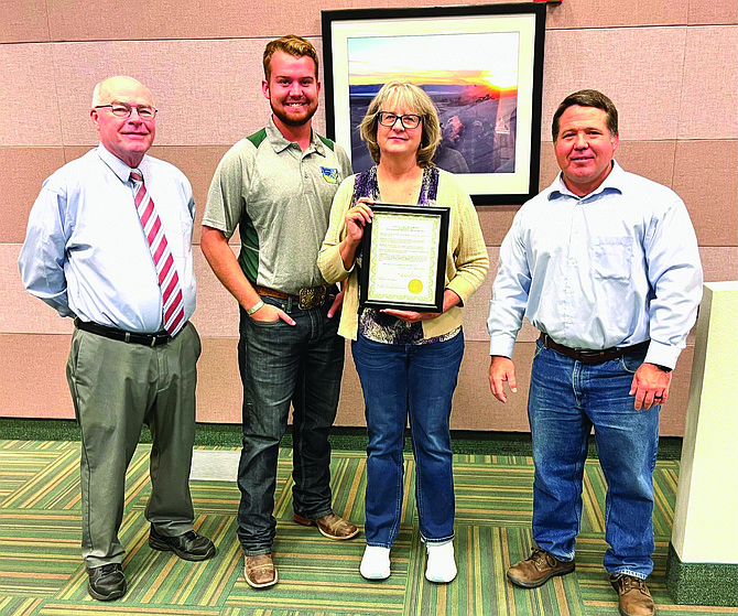 Churchill County commissioners issued a proclamation at their May 4 meeting declaring May as Nevada Wildlife Awareness Month. From left are Commissioners Bus Scharmann and Myles Getto, Linda Brown from the University of Nevada, Reno’s Extension office in Churchill County, and Commissioner Dr. Justin Heath.