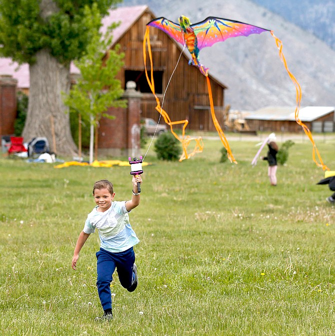 Colton Roush participates in the 2019 kite flying weekend at the Dangberg Historic Park. Photo special to The R-C by the Friends of Dangberg Home Ranch