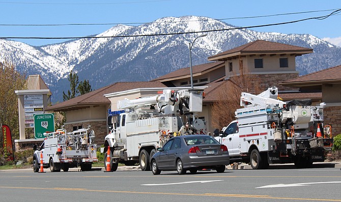 NV Energy workers on Highway 395 in Minden on May 3.
